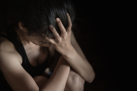 soft  focus. young woman sad and fear stressful depressed emotional. stop abusing violence in women,person with health anxiety. Suicidal thoughts.の写真素材