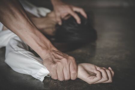 Husband assaulted his wife severely, The concept of violence against women and domestic violence.の写真素材
