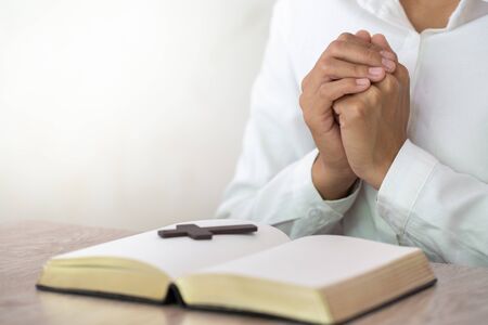 Religious young woman praying to God in the morning, spirituality and religion, Religious concepts