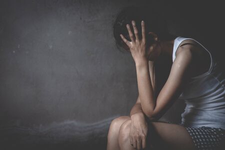 Teenage girls with problems, Sad depressed woman suffering from family life. women sitting in dark...