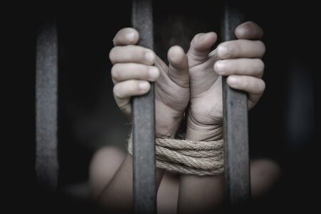 The child was tied up with a rope and was in a cell. Stop violence against children, child labor,...