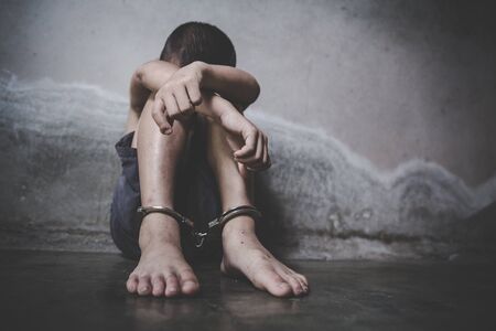 Child who are victims of the human trafficking process and have  bruises on the body.Child labor,...