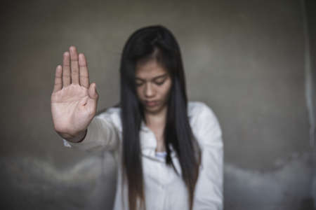 woman raised her hand for dissuade, Abuse, campaign stop violence against women. Stop sexual harassment and rape.の写真素材