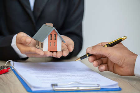 Real estate agents ask clients to sign documents to legally enter into contracts, home sales and...
