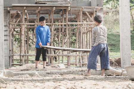 Children are forced to work constructionの写真素材