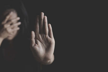 concept photo of sexual assault, traumatized young women.  Stop violence and rape concept.の写真素材