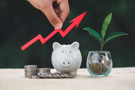 Piggy bank, concept of saving money for house, Savings money for buy house and loan to business...