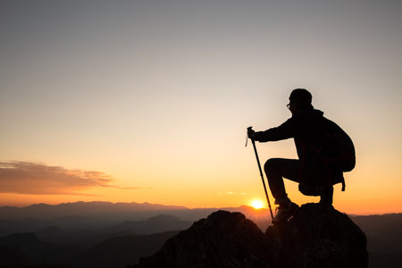Silhouette woman on mountain successful business leadership, top person winner.Sports business and active life concept,hiking.の写真素材