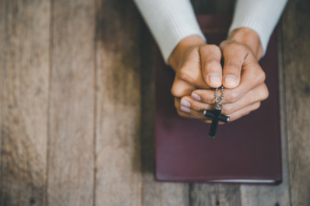 Religious young woman praying to God in the morning, spirtuality and religion, Religious conceptsの写真素材