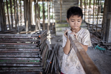 Poor children are forced to work construction, Violence children and trafficking concept,Anti-child labor, Rights Day on December 10.の写真素材