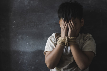 Children who are victims of human trafficking Tied the rope attached to the wrist with stress and...
