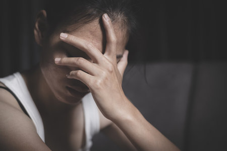 Abused women blurred background. Stop violence against women. Intimidation and abuse of women.  Physical and psychological harassment. Emotional and psychological violence.の写真素材