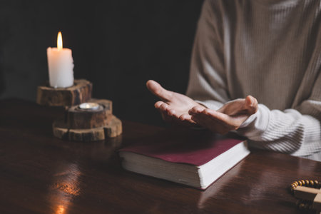 Woman hands praying for blessing. Praying hands with faith in religion and belief in God.の写真素材