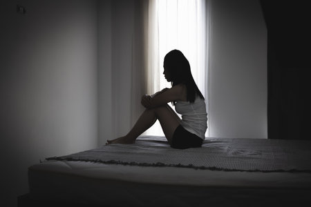 Depression in women. The concept of sexual harassment against women and domestic violence.の写真素材