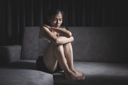 Depression in women. The concept of sexual harassment against women and domestic violenceの写真素材