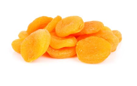 Dried apricot fruits on white background, health food conceptの写真素材