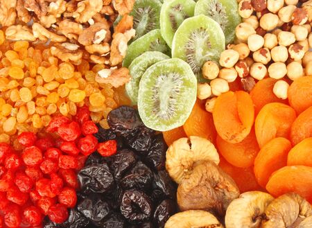 Mixed dried fruits background, health food concept.の写真素材