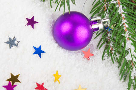 Blue Christmas ball on fir tree branch, celebration decorationの写真素材