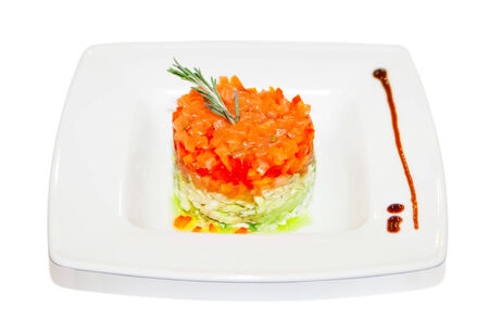 Salad with boiled vegetable and rosemary sprig on plate, restaurant menuの写真素材