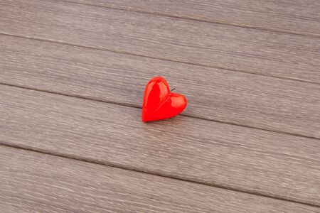 Red heart on wooden background, vector illustrationの写真素材