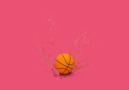 3d rendering of basketball drop with water splash on pink background, 3d minimal concept for sportの写真素材