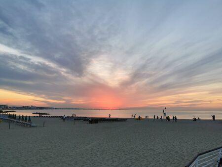 rimini beach beautiful sunset with bright colors and sea