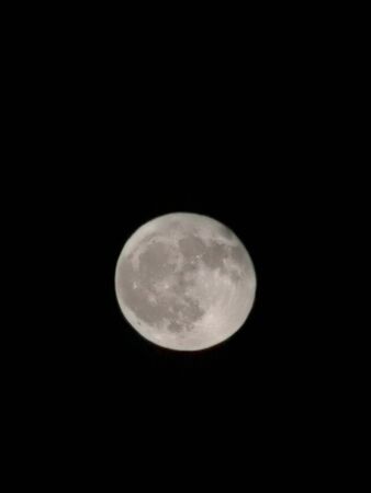 beautiful full moon in clear black skyの写真素材