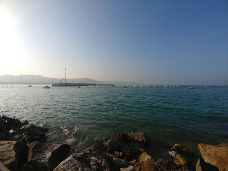 cliff and sea port of sicily in palermo on sunny day