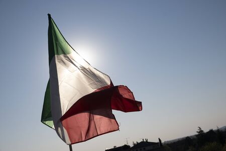 italian flag wind sky real time video covid-19の写真素材