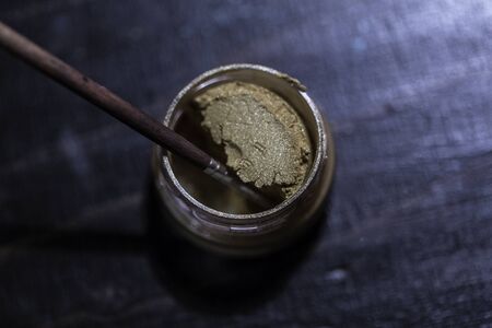 bodypainting water colors slip cake and metallic colorsの写真素材