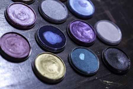 bodypainting water colors slip cake and metallic colorsの写真素材