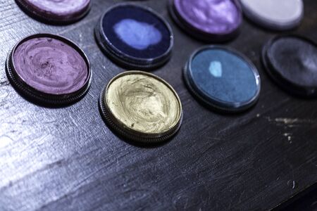 bodypainting water colors slip cake and metallic colorsの写真素材