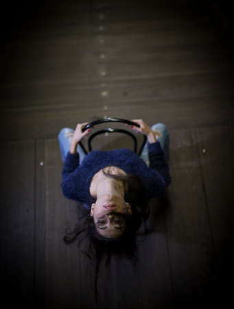 beautiful woman poses for photo portrait dark hair blue sweatebeautiful woman poses for photo portrait dark hair blue sweaterr. High quality photoの写真素材