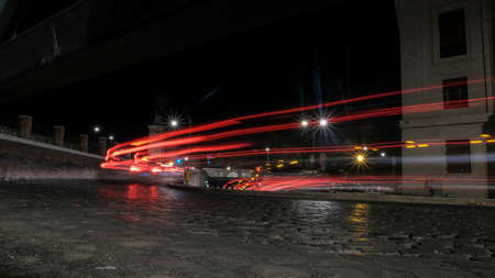 light trails of cars through the streets of Rome. High quality photo