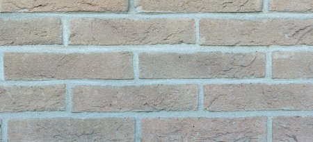 Brown brick wall background. High quality photo