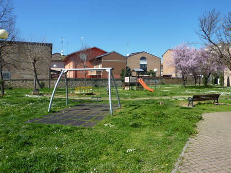 An empty childrens playground in the small town of Bibbiano, Reggio Emilia, Italy. High quality photoの写真素材