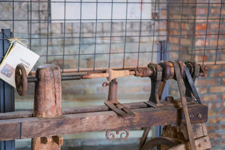 old pedal wood lathe. High quality photo