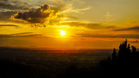 beautiful sunset over green hills of Emilia in Italy. High quality photo