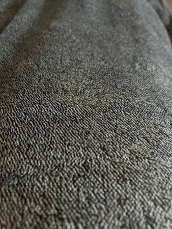 gray fabric texture with long hair macro. High quality photo