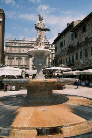 Statue and fountain in Piazza del Erbe Verona Italy. High quality photoの写真素材
