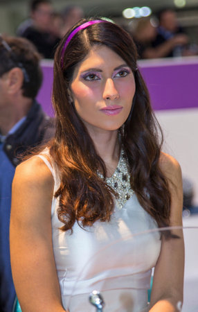 Milano, Italy - 2012 10 31: Eicma Motor Bike Event black hair brunette italian girl. High quality photoのeditorial素材