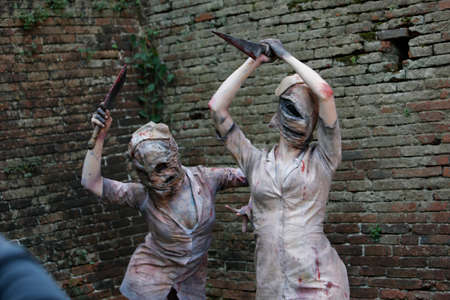 Lucca, Italy - 2018 10 31: Lucca Comics free cosplay event around city Silent Hill Nurse. High quality photoのeditorial素材