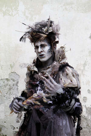 Lucca, Italy - 2018 10 31: Lucca Comics free cosplay event around city decadent man covered with flowers. High quality photoのeditorial素材