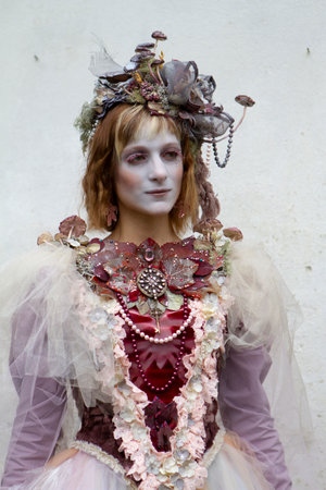 Lucca, Italy - 2018 10 31: Lucca Comics free cosplay event around city decadent lady covered with flowers. High quality photoのeditorial素材