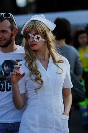 Lucca, Italy - 2018 10 31: Lucca Comics free cosplay event around city Kill Bill Nurse. High quality...