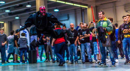 Lucca, Italy - 2018 10 31: Lucca Comics free cosplay event around city Darth Maul boy. High quality...