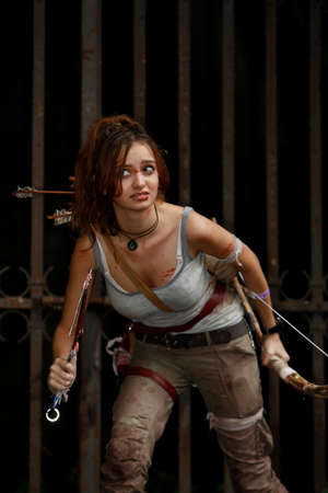 Lucca, Italy - 2018 10 31: Lucca Comics free cosplay event around city Tomb Rider girl. High quality...