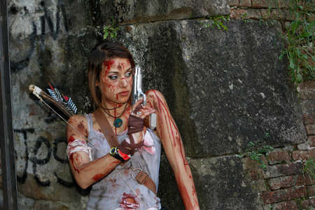 Lucca, Italy - 2018 10 31: Lucca Comics free cosplay event around city tomb rider girl. High quality photoのeditorial素材