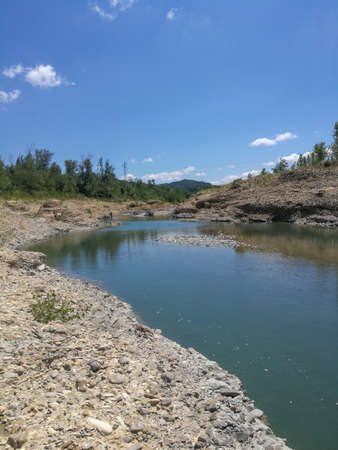 panorama of the Enza river in Reggio Emilia loop and stones. High quality photoの写真素材