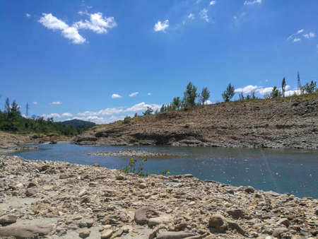panorama of the Enza river in Reggio Emilia loop and stones. High quality photoの写真素材